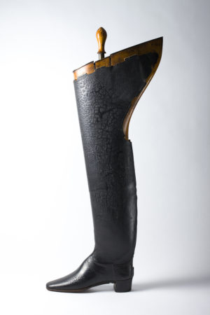 Lifeguard military thigh boot c.1850. Exhibition category Scale resized London College of Fashion presents Footnotes: Intimate Stories of Shoes at Sutton House Opening on Wednesday 9 May 2018 Sutton House, 2 and 4 Homerton High Street, Hackney, London E9 6JQ
